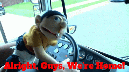 A Puppet Driving A Bus With The Words " Alright Guys We 'Re Home " GIF