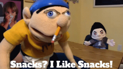 A Puppet With A Pencil In His Mouth And The Words Snacks I Like Snacks Below It GIF