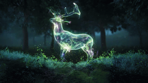 A Purple And Blue Flame Is Flying Through The Air GIF