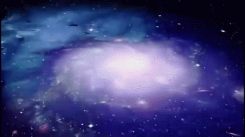 A Purple And Blue Galaxy With A Lot Of Stars GIF
