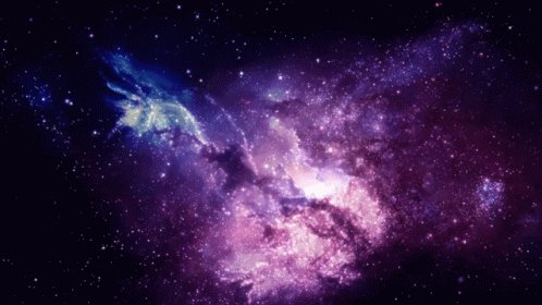 A Purple And Blue Galaxy With Many Stars GIF