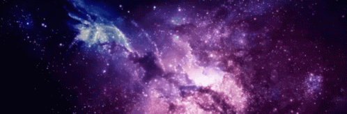 A Purple And Blue Galaxy With Many Stars GIF