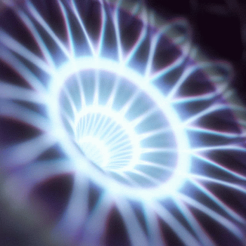 A Purple And Blue Swirl With A Light Coming Out Of The Center GIF