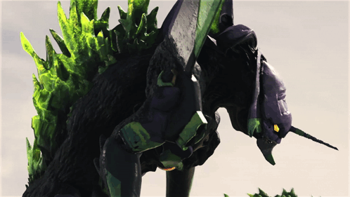 A Purple And Green Monster With A Sword In Its Hand GIF
