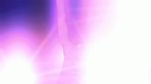A Purple And White Background With A Purple And White Swirl GIF