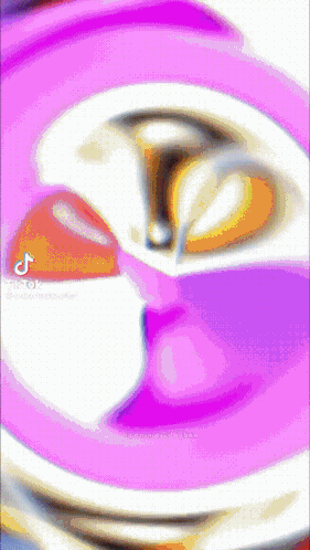 A Purple And White Circle With A Tiktok Logo On The Bottom Right GIF