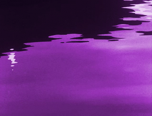 A Purple Background With A Black Border And A Few White Spots GIF