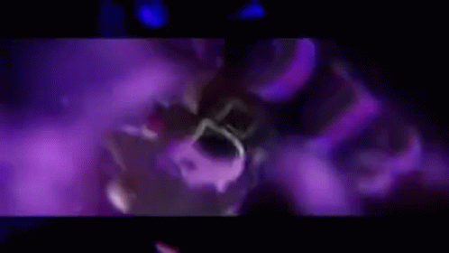 A Purple Background With A Person Standing In The Middle Of It . GIF