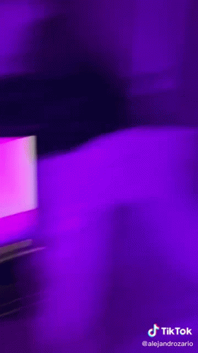 A Purple Background With A Tiktok Logo On The Bottom Right Corner GIF