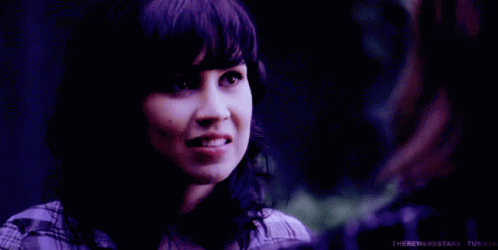 A Purple Background With A Woman And The Word Awkward In White GIF