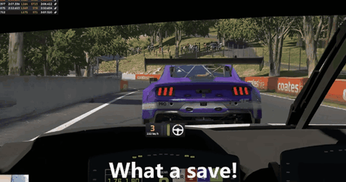 a purple car is driving down a race track and the words what a save are on the dashboard