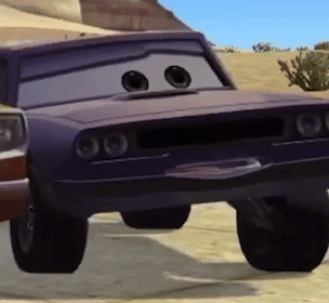 A Purple Cartoon Car With Big Eyes Is Parked In A Desert . GIF