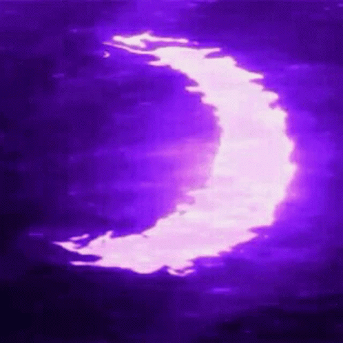 A Purple Crescent Moon Is Reflected In The Water Of A Lake . GIF