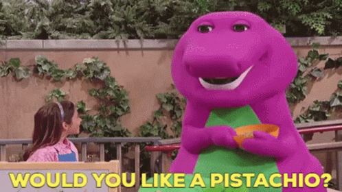 A Purple Dinosaur Is Holding A Bowl Of Pistachios Next To A Little Girl . GIF