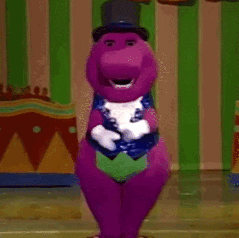 A Purple Dinosaur Is Wearing A Top Hat And Gloves And Dancing . GIF