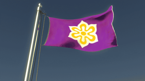 A Purple Flag With A Yellow Flower In The Middle GIF