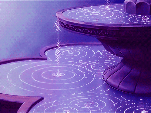A Purple Fountain With Circles On The Floor GIF