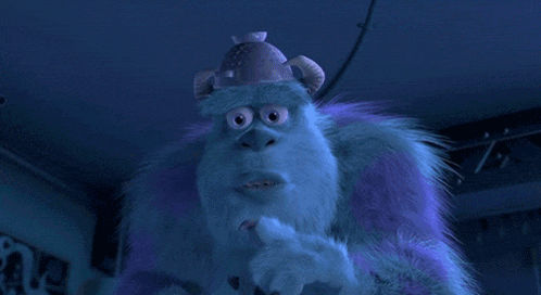 A Purple Furry Monster With A Pink Hat On GIF
