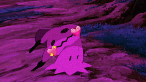 a purple monster is surrounded by pink hearts