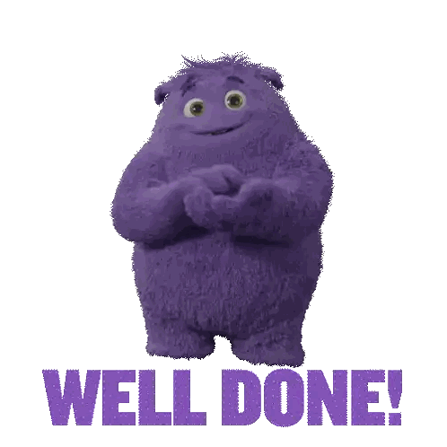 a purple stuffed animal with the words well done written below it