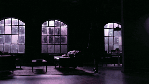 A Purple Window With A Picture Of A Butterfly On It GIF