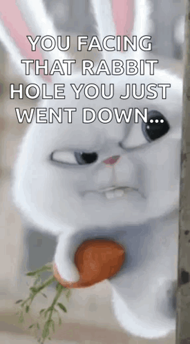 A Rabbit Is Holding A Carrot In Its Mouth . GIF