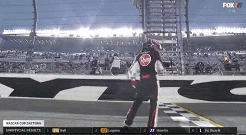 A Race Car Driver Celebrates Winning The Nascar Cup Daytona GIF
