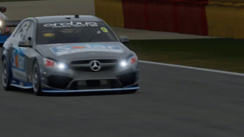 A Race Car That Has The Number 9 On The Front GIF