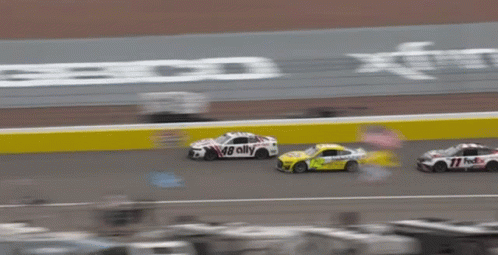 A Race Car With 48 Ally Written On The Side GIF