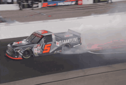 A Race Car With Frontline Written On The Side Of It GIF