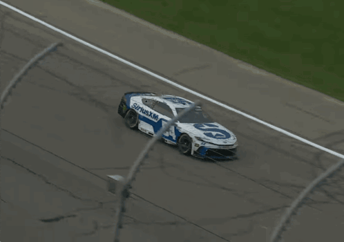 a race car with siriusxm 54 on the side of it