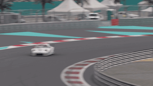 A Race Car With The Number 21 On The Side GIF