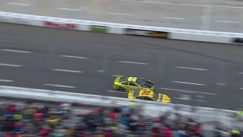 A Race Car With The Number 22 On The Side Of It GIF