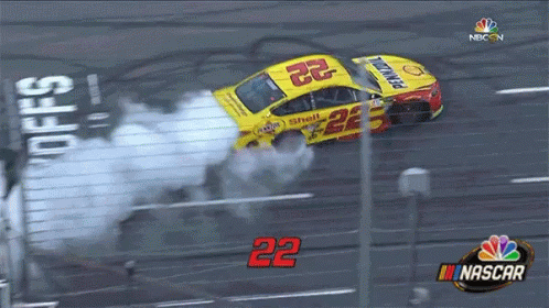 A Race Car With The Number 22 On The Side GIF