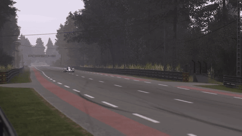A Race Car With The Number 3 On The Side Of It GIF