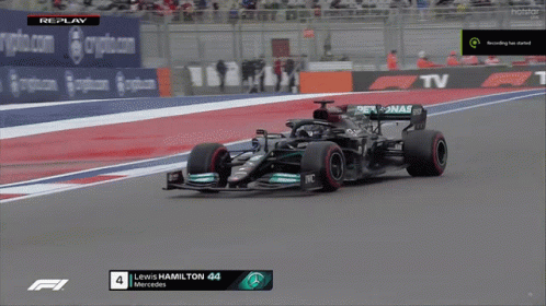 A Race Car With The Number 44 On The Front GIF