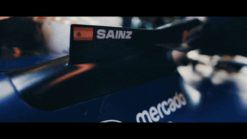 A Race Car With The Number 55 Painted On It GIF