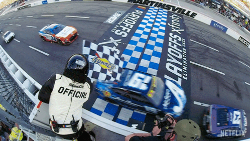 A Race Car With The Number 6 On The Back Of It GIF
