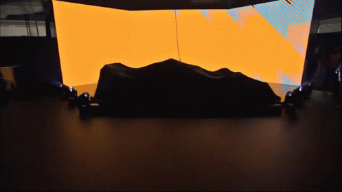 A Race Car With Velo Written On The Side Of It GIF
