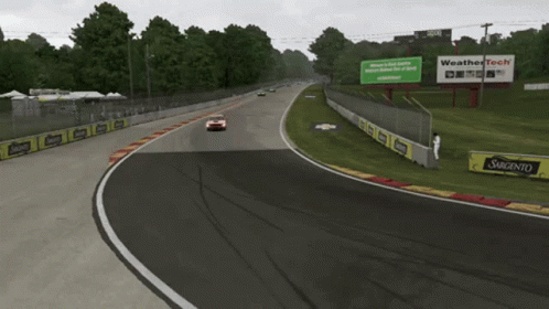 A Race Track With A Sign That Says Weather Tech GIF