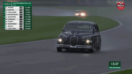 A Racing Car With The Number 102 On The Side GIF