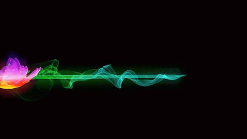 A Rainbow Colored Flower Is Surrounded By Green Smoke GIF