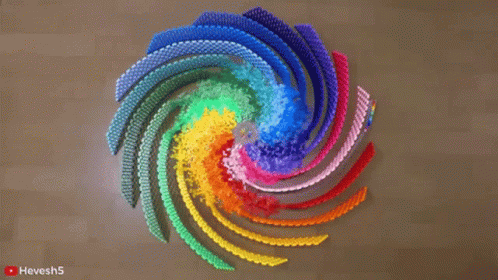 A Rainbow Colored Swirl Made Out Of Plastic Beads With A Youtube Logo In The Bottom Right Corner GIF