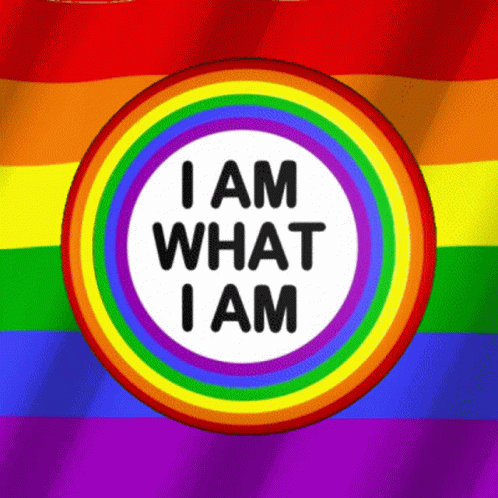 A Rainbow Flag With The Words I Am What I Am In A Circle GIF