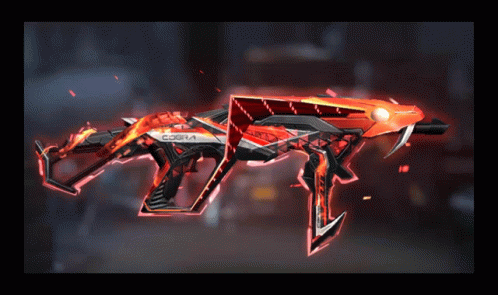 A Red And Black Weapon With The Word Cobra On The Side GIF