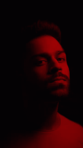 A Red And Blue Background With A Green Line GIF