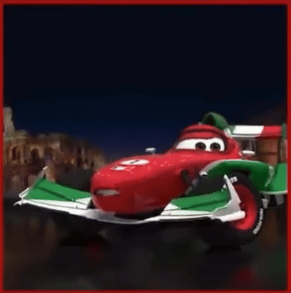 a red and green racing car with the number 6 on the side