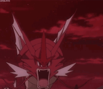 A Red And White Dragon With Its Mouth Open In A Video Game GIF