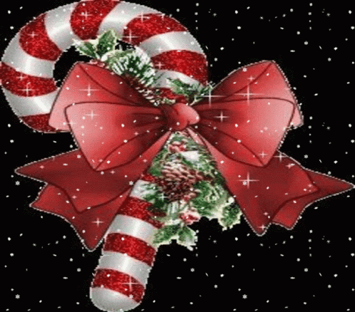 A Red And White Striped Candy Cane With A Red Bow GIF
