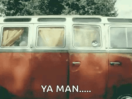 A Red And White Van With The Words Ya Man Written On The Side GIF